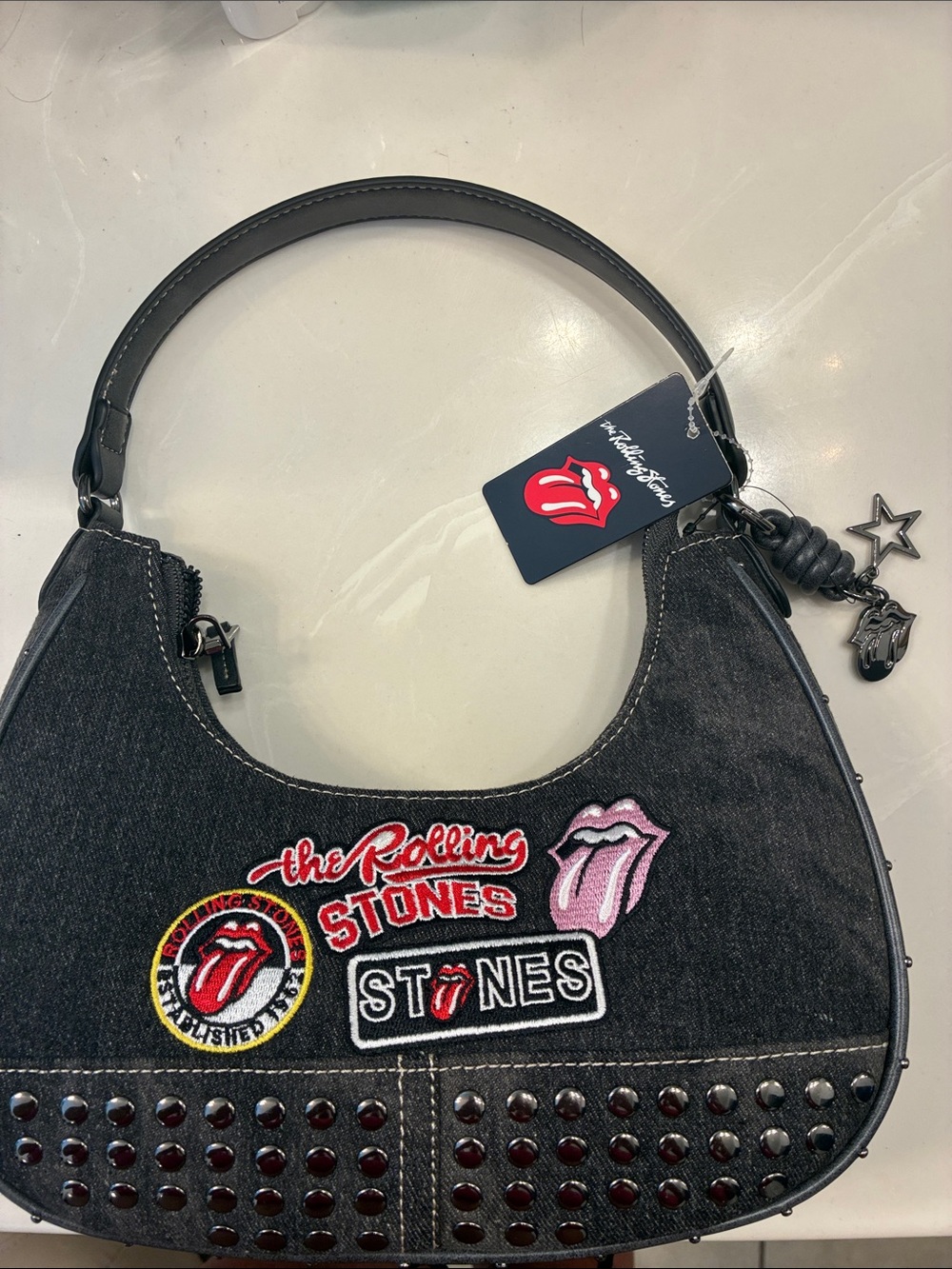 the Rolling Stones Black Denim Shoulder Bag with Patch Details